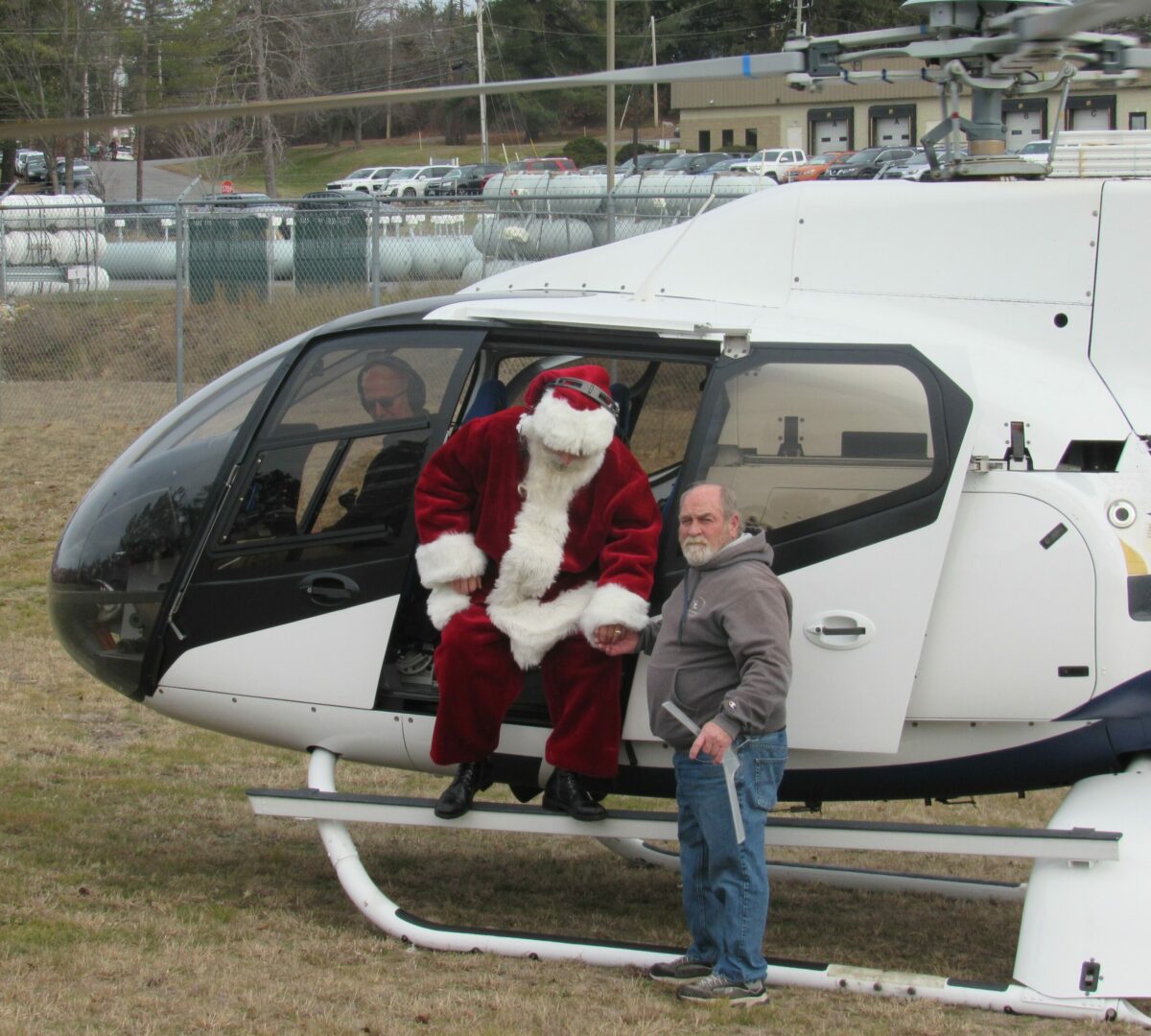 Festive Fun: Santa Lands by Helicopter at Museum